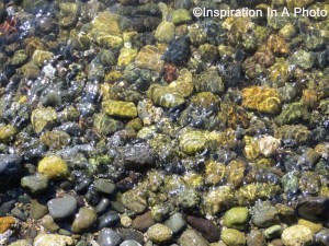 Tide-water over rocks at beach